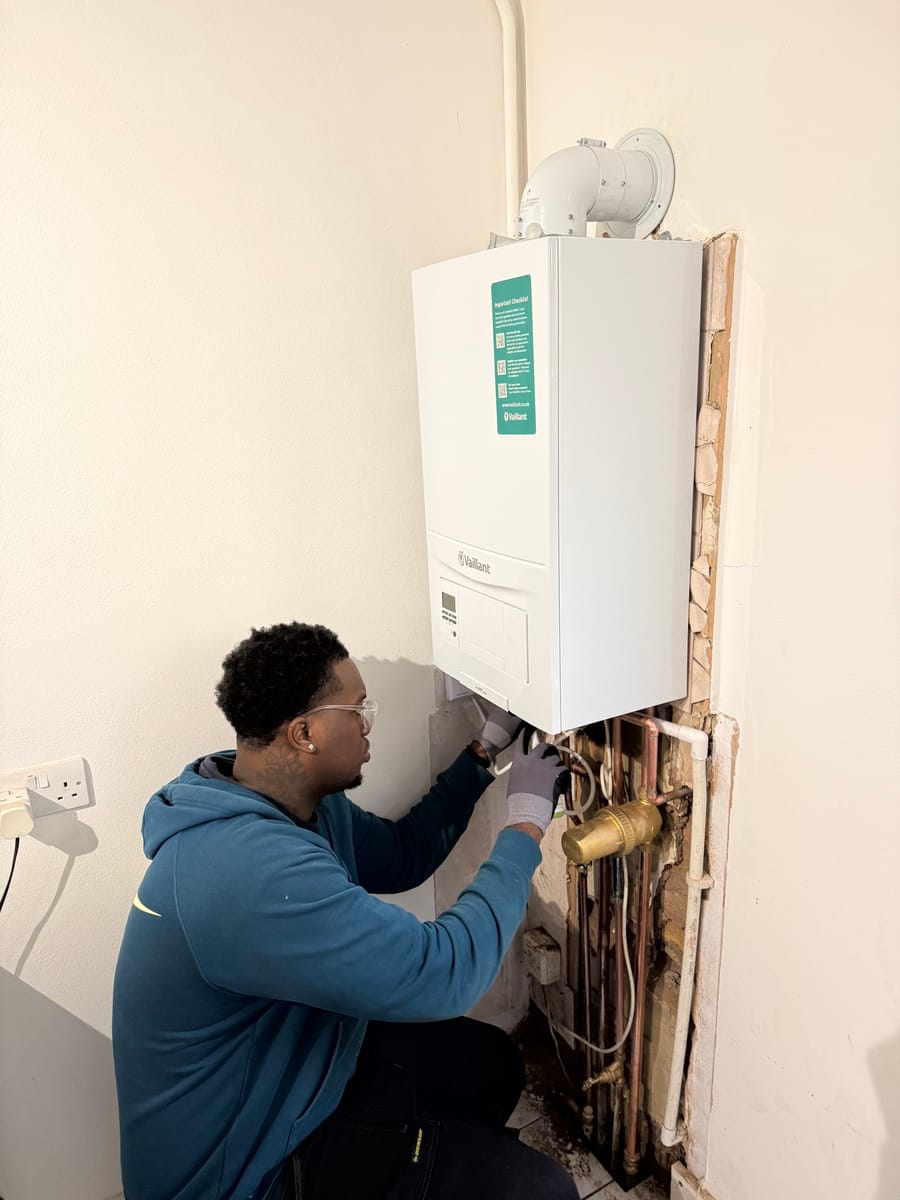 Our engineer making off the pipework on a new Vaillant combi boiler